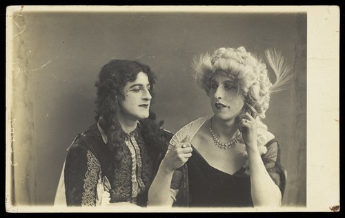 Download the full-sized image of Two men in elaborate drag. Photographic postcard. 192--.