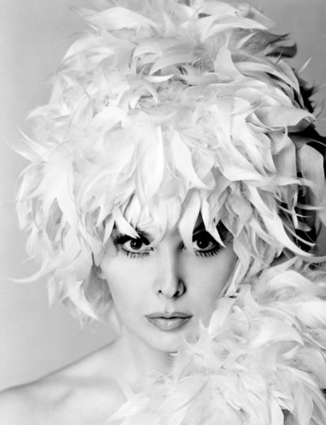 Bambi Headshot in White Feather Cap - Digital Transgender Archive