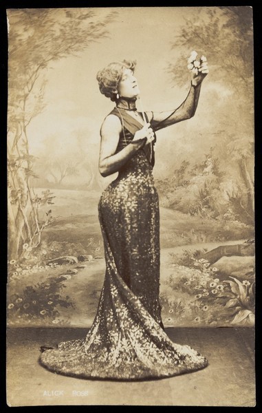 Download the full-sized image of An actor performing in drag. Photographic postcard, 191-.