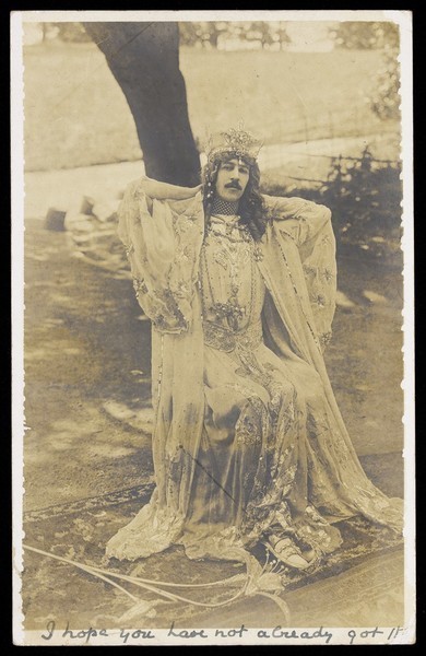 Download the full-sized image of Henry Cyril Paget, 5th Marquis of Anglesey, seated in drag by a tree. Photograph, 1905.