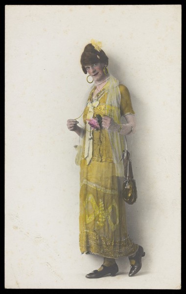 Download the full-sized image of Ralph Mellor in drag. Coloured photographic postcard by L.S. Langfier, 192-.