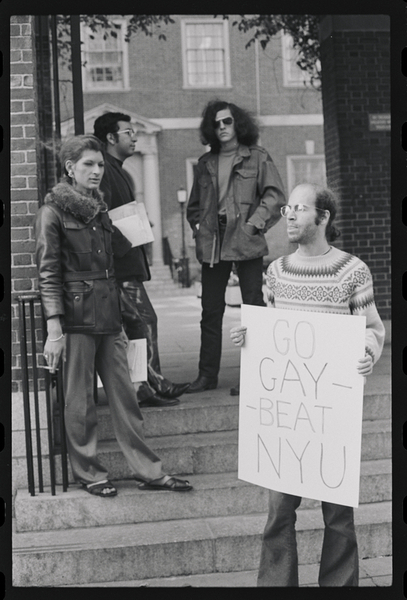 Download the full-sized image of A Photograph of Sylvia Rivera and Three Protesters Standing Together with Signs