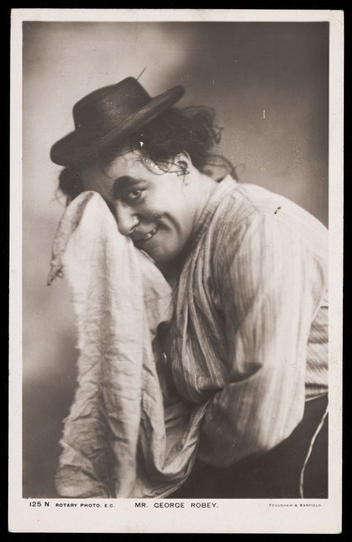 Download the full-sized image of George Robey in character. Photographic postcard by Foulsham & Banfield, ca. 1905-1910.