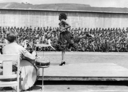 Download the full-sized image of Stage entertainment with musicians and male dancer in female dress, San Quentin Little Olympics Field Meet, 1930