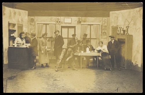 Download the full-sized image of Actors performing at a prisoner of war camp in Münster. Photographic postcard. 1916.