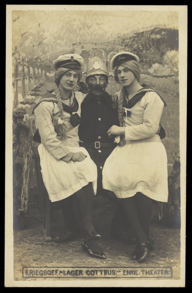 Download the full-sized image of British prisoners of war performing at a show at a prisoner of war camp in Cottbus. Photographic postcard by P. Tharan, 191-.