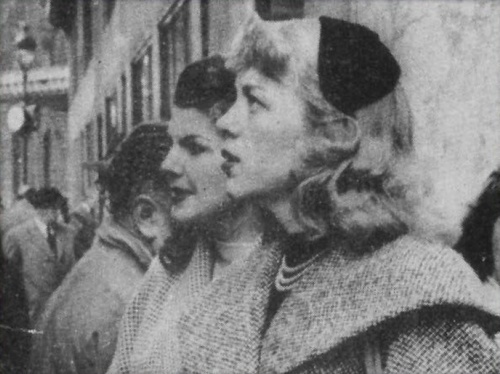Download the full-sized image of Roberta Cowell Standing in Crowd