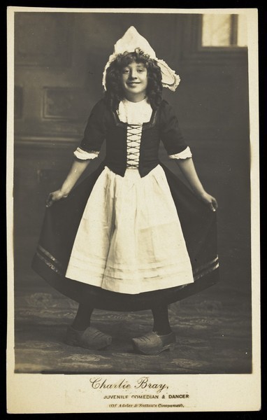 Download the full-sized image of Charlie Bray in character as a Dutch girl. Photographic postcard, 191-.