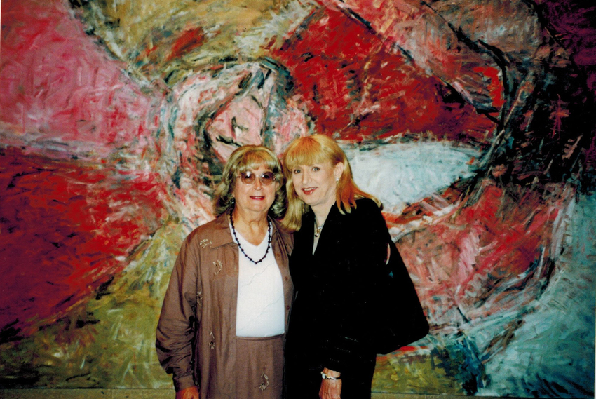 Download the full-sized image of Alison Laing and Rikki Swin Pose in Front of Artwork