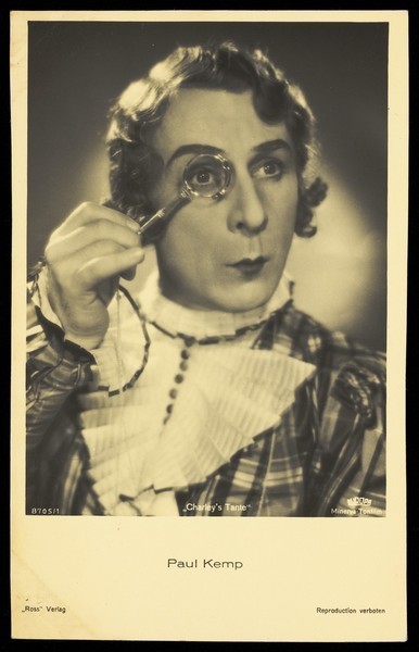 Download the full-sized image of Paul Kemp in drag as Charley's aunt. Photographic postcard, 1933/1934.