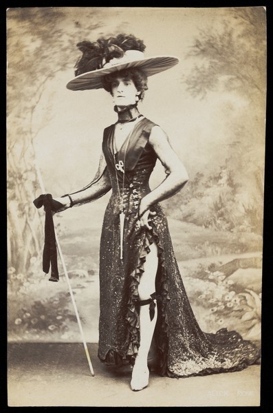 Download the full-sized image of An actor performing in drag. Photographic postcard, 191-.