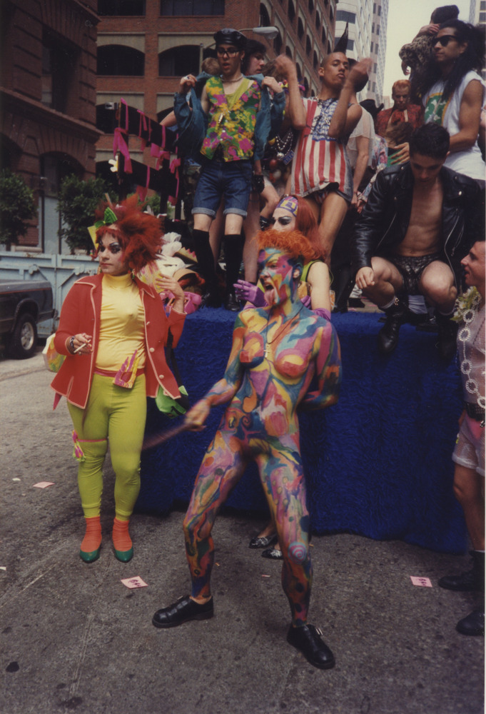 Download the full-sized image of Photograph of People in Costume and Body Paint in front of Pride Float