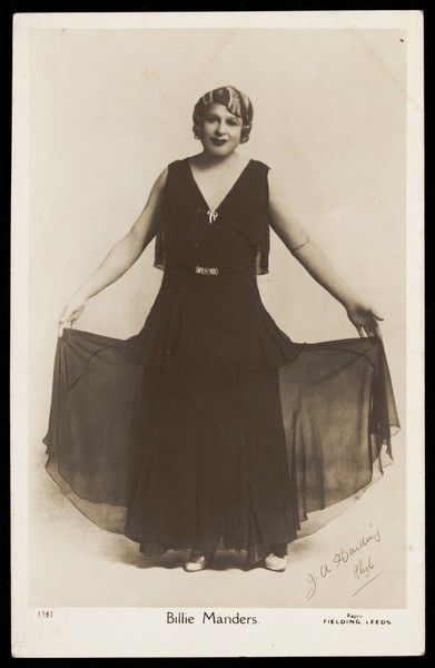 Download the full-sized image of Billie Manders in character. Photographic postcard by J.A. Harding, 193-.