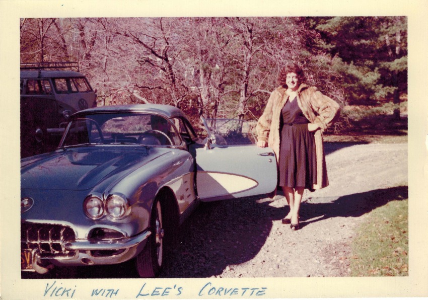 Download the full-sized image of A Photograph of Vicki with a Corvette