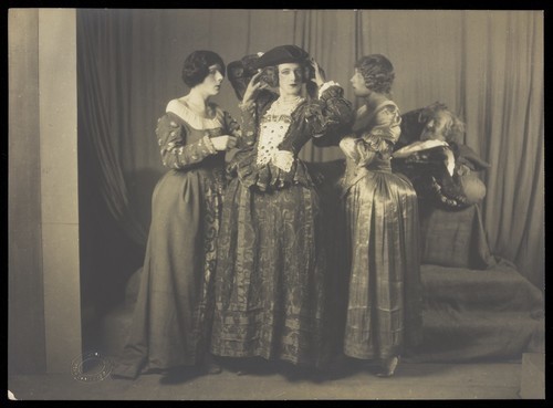 Download the full-sized image of Cecil Beaton in theatrical drag, with others. Photograph by Hill & Saunders , ca. 1925.
