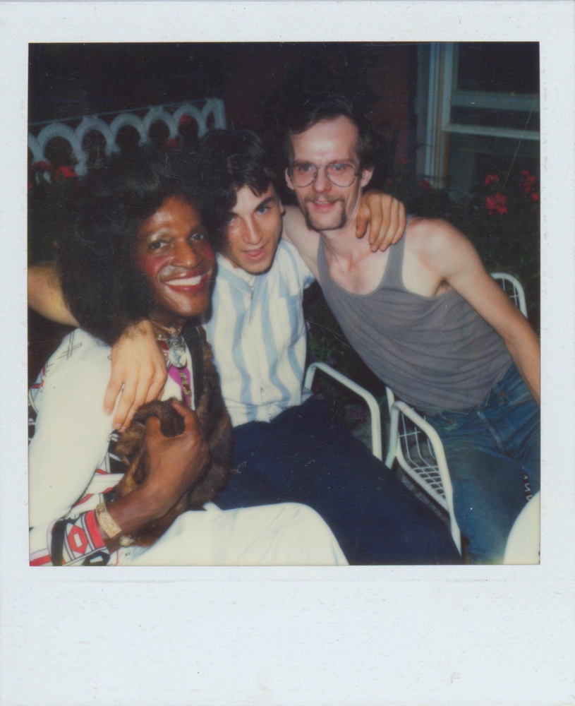 Download the full-sized image of A Photograph Including Marsha P. Johnson and David Combs Sitting Outside on Patio Chairs