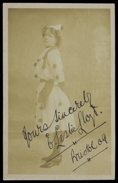 Download the full-sized image of E. Leslie Lloyd in drag as a Pierrette. Photographic postcard, 1909.