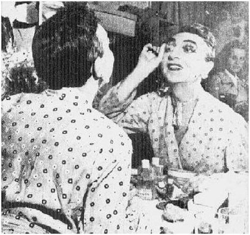 Download the full-sized image of Lucian Phelps Putting on Makeup