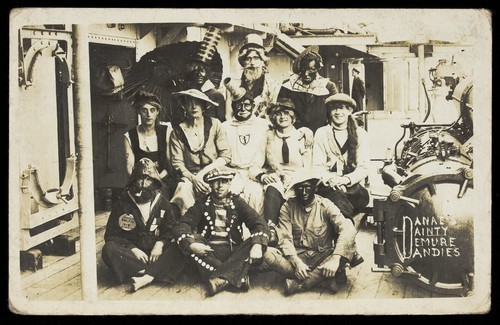 Download the full-sized image of Sailors in theatrical costume. Photographic postcard, 1919.